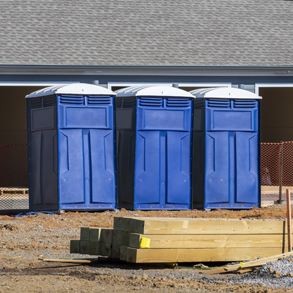 what is the cost difference between standard and deluxe porta potty rentals in Aquilla